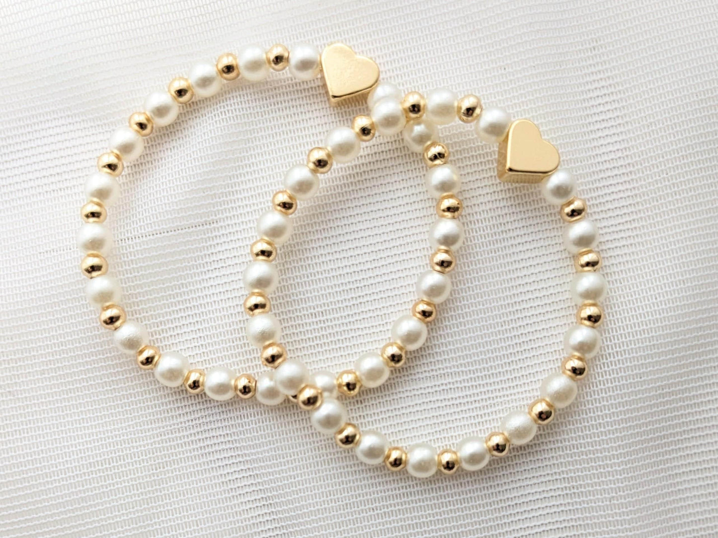 Pearls and gold plated heart