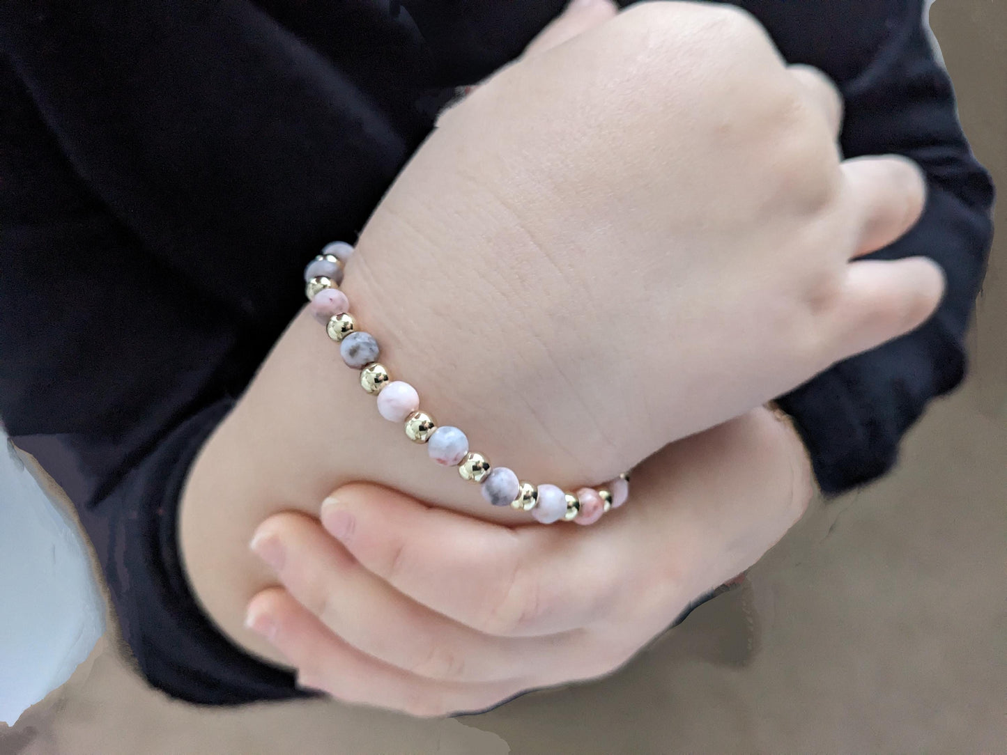 Pink stone and gold plated