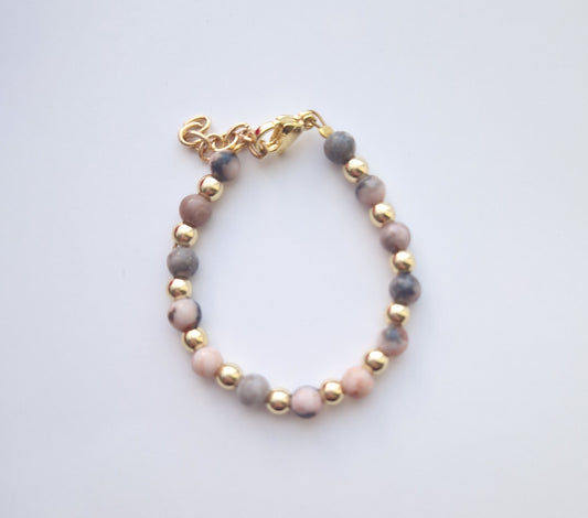 Pink stone and gold plated